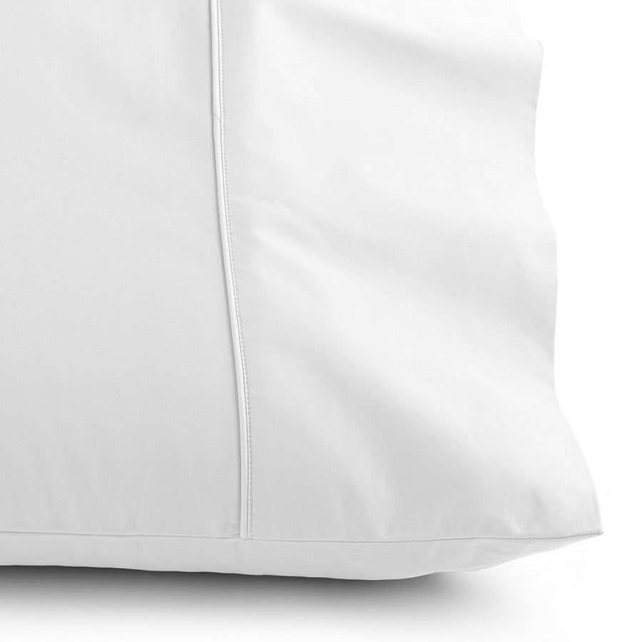 Close-up of Flaxfield Linen king-sized cotton sateen pillowcase with a cuffed hem, highlighting the 400 thread count and soft, luxurious texture.